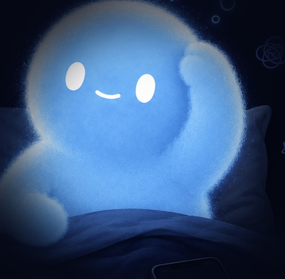 Brainy sitting up in bed, rubbing its head